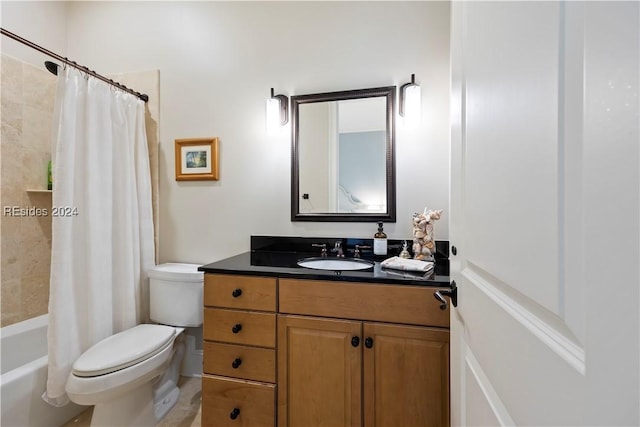 full bathroom featuring vanity, shower / tub combo, and toilet