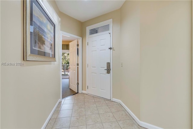 entryway featuring light tile patterned floors