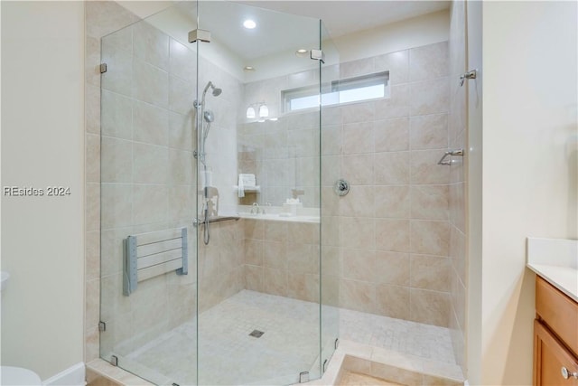 bathroom featuring vanity and walk in shower