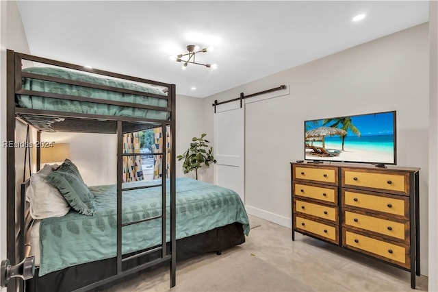 bedroom with a barn door