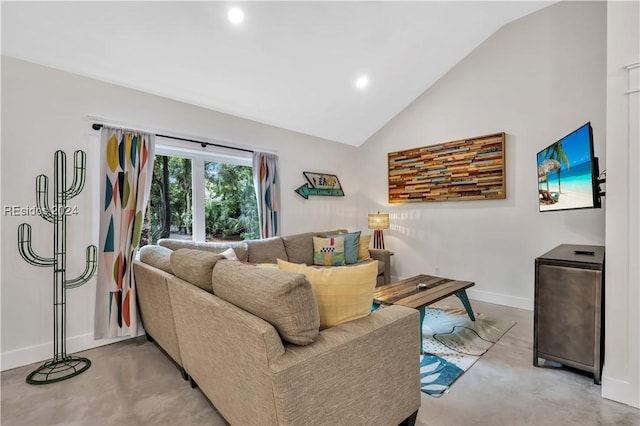 living room featuring vaulted ceiling