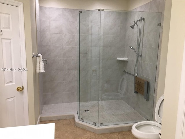 bathroom with toilet and walk in shower