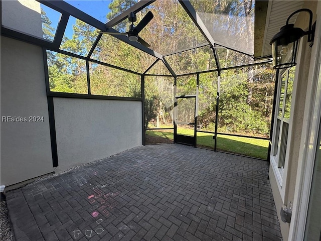 view of patio / terrace with a lanai