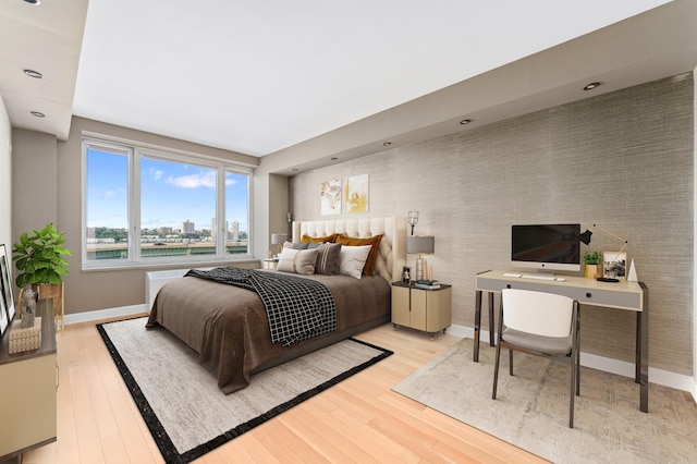 bedroom featuring light wood-type flooring