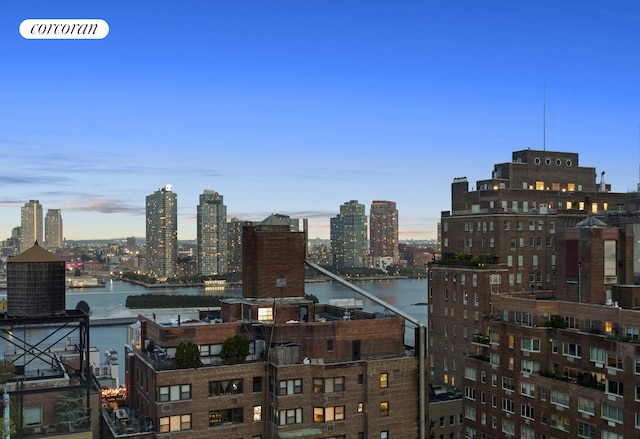 property's view of city with a water view