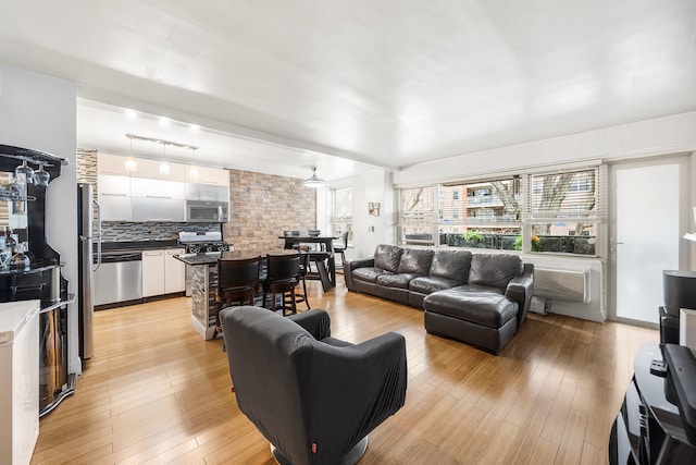 living room featuring light wood-type flooring