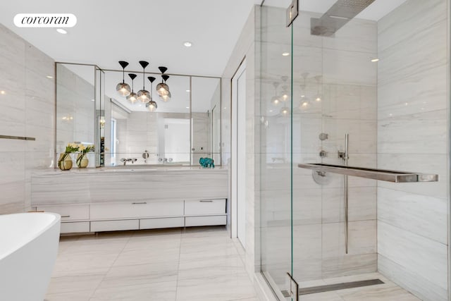 bathroom with tile flooring, tile walls, vanity, and independent shower and bath