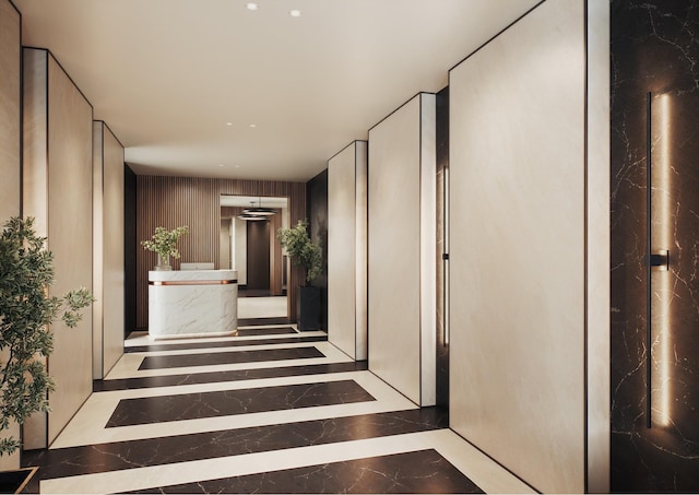 hall featuring dark tile patterned flooring