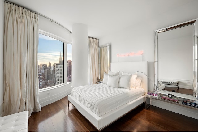 bedroom featuring hardwood / wood-style floors