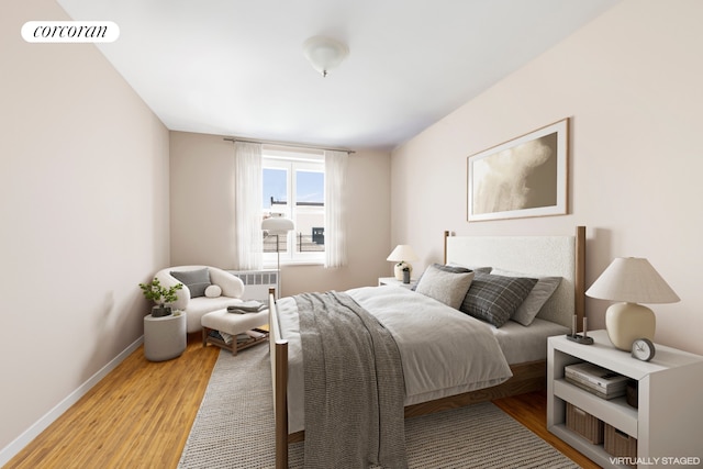 bedroom with light hardwood / wood-style floors