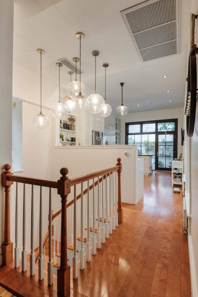 hallway featuring light tile flooring