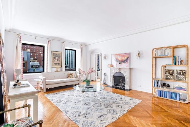 living room with crown molding and light parquet floors