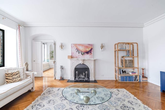 living room with parquet floors and crown molding