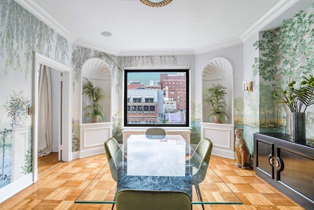 dining room with ornamental molding and light parquet floors