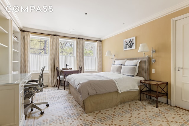 bedroom featuring multiple windows and crown molding