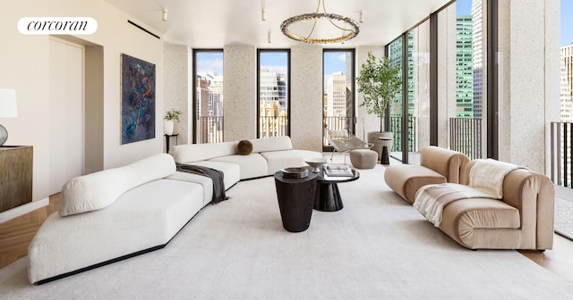 living room featuring a chandelier