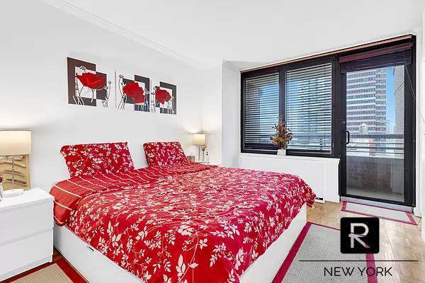 bedroom with ornamental molding