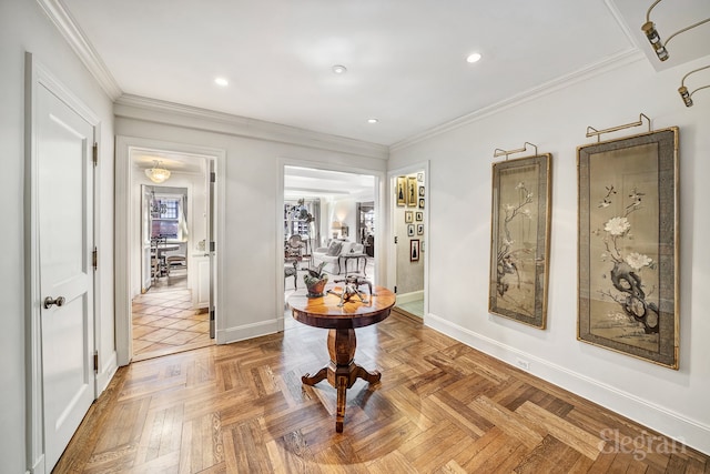 hallway with ornamental molding and light parquet flooring