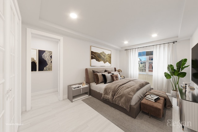 bedroom with light wood-type flooring