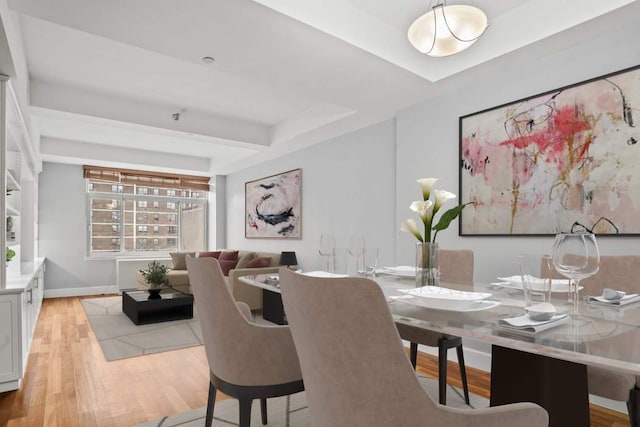 dining room featuring light hardwood / wood-style flooring