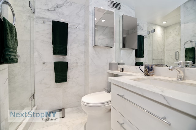 bathroom with toilet, an enclosed shower, vanity, and tile walls