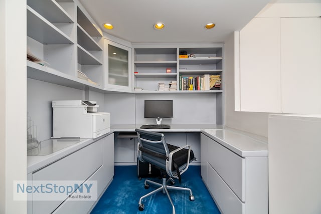 office space featuring built in desk