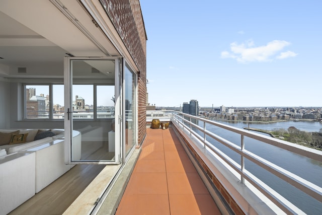 balcony featuring a water view