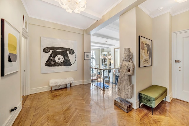 foyer with light parquet floors, beam ceiling, ornamental molding, and a notable chandelier