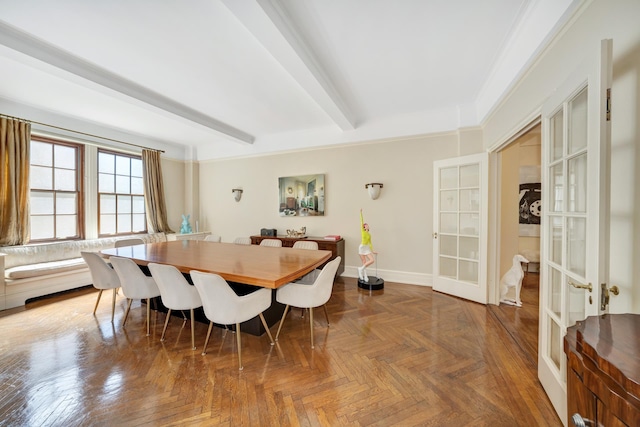 dining area with beamed ceiling, ornamental molding, parquet flooring, and french doors