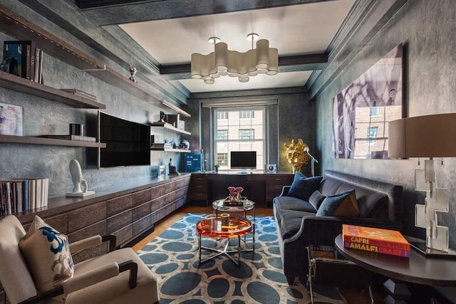 living room with hardwood / wood-style floors and crown molding