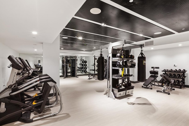 gym featuring hardwood / wood-style floors