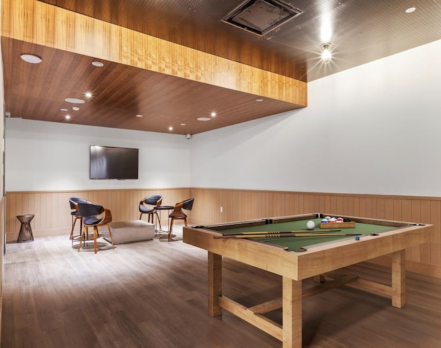 rec room featuring wooden walls, billiards, hardwood / wood-style floors, and wood ceiling