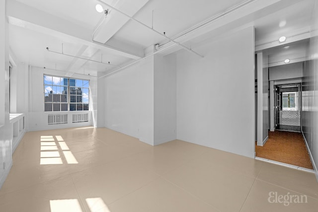 empty room featuring tile patterned floors