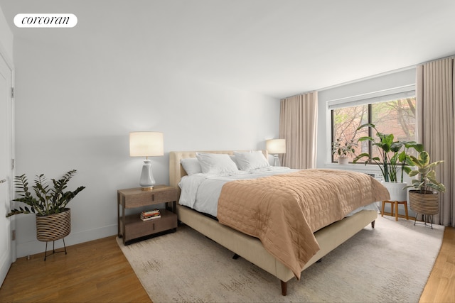 bedroom featuring hardwood / wood-style floors