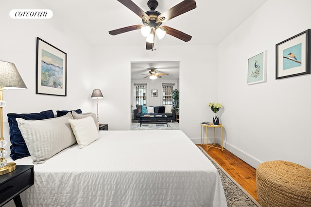 bedroom featuring ceiling fan and hardwood / wood-style floors