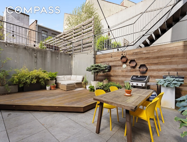 view of patio / terrace featuring area for grilling and a deck