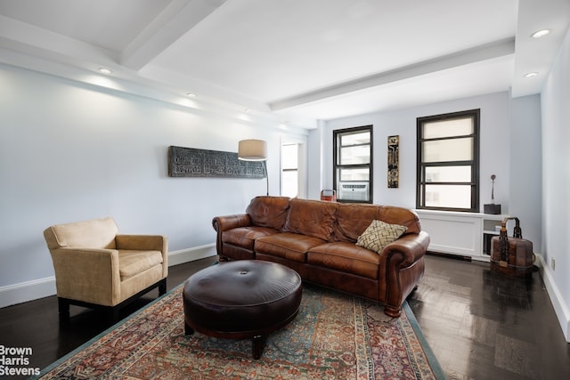 living room featuring beam ceiling and dark parquet floors