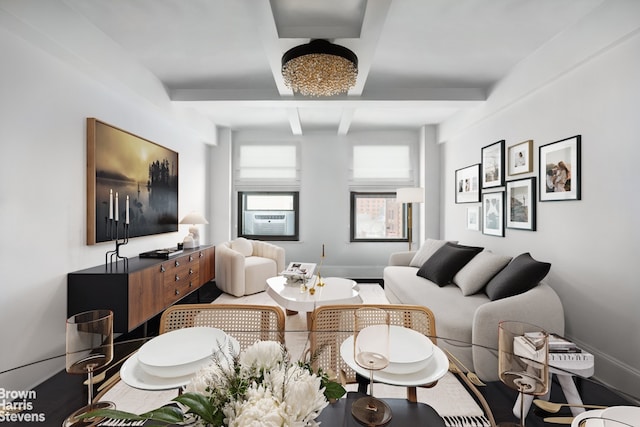 living room featuring beamed ceiling