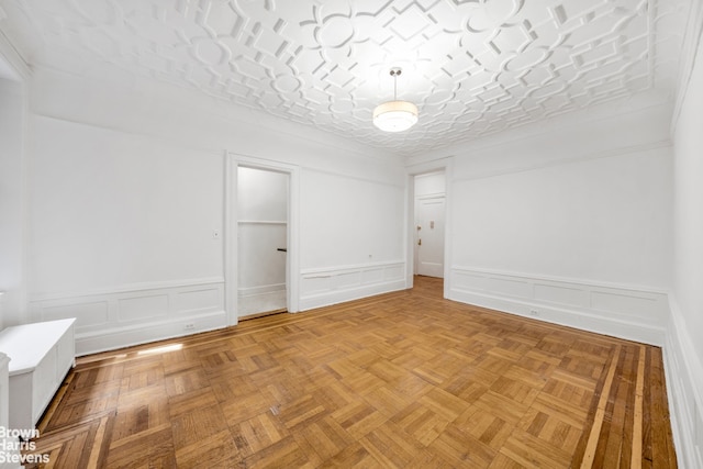 unfurnished room featuring light parquet flooring