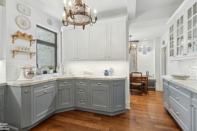 bar featuring beverage cooler, tasteful backsplash, white cabinetry, and dark wood-type flooring