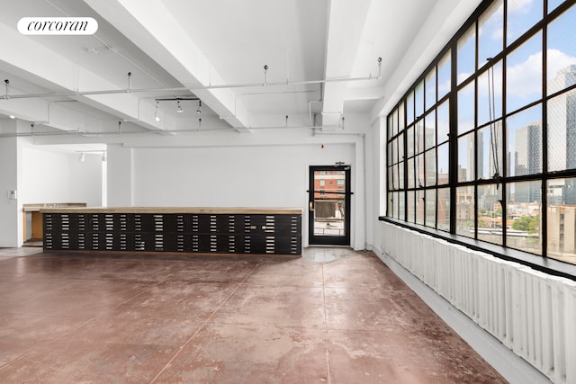 interior space with concrete flooring