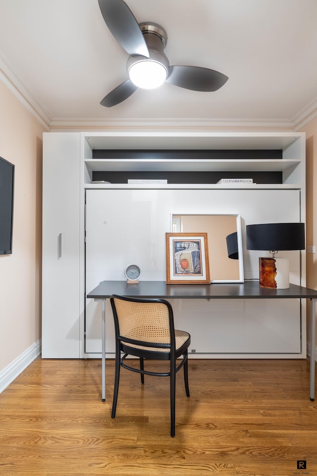 interior space featuring ornamental molding, ceiling fan, and hardwood / wood-style floors