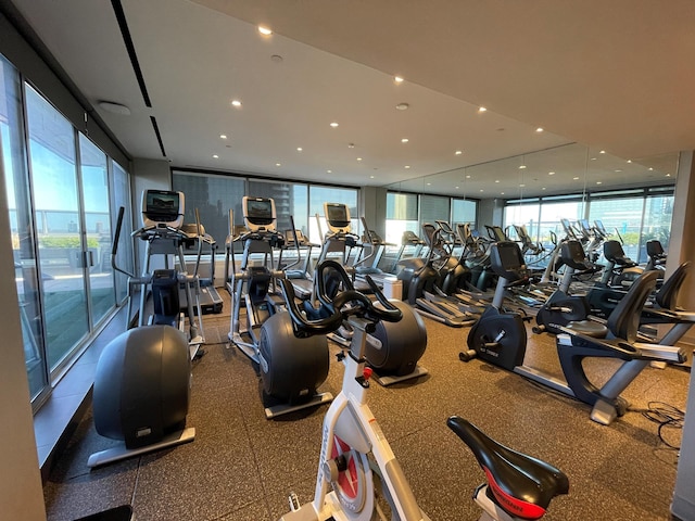 gym featuring floor to ceiling windows