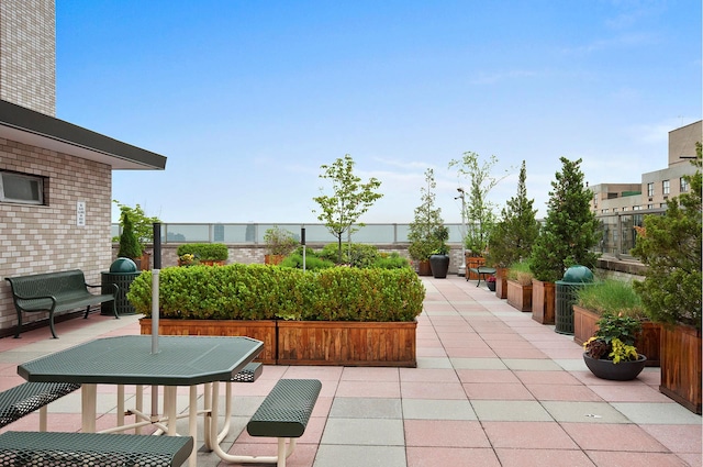 view of patio featuring a grill