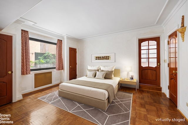 bedroom with crown molding and dark parquet flooring