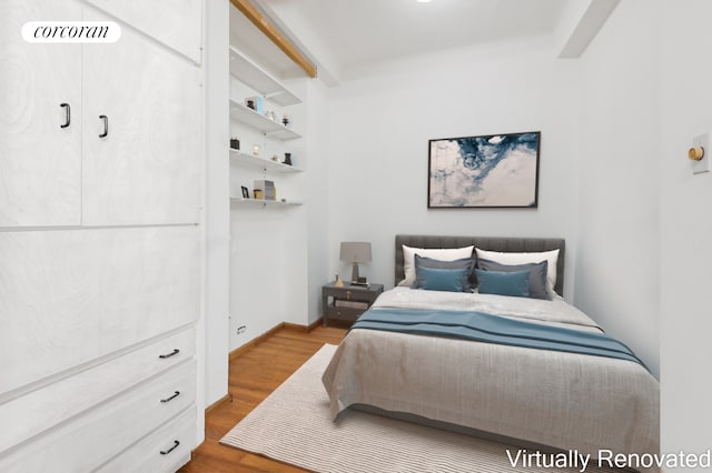 bedroom featuring hardwood / wood-style floors