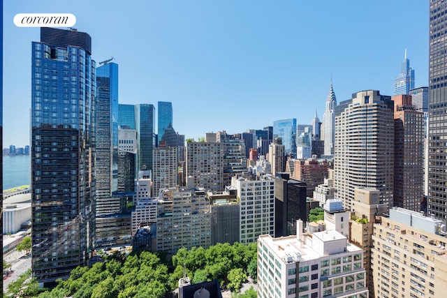 property's view of city featuring a water view