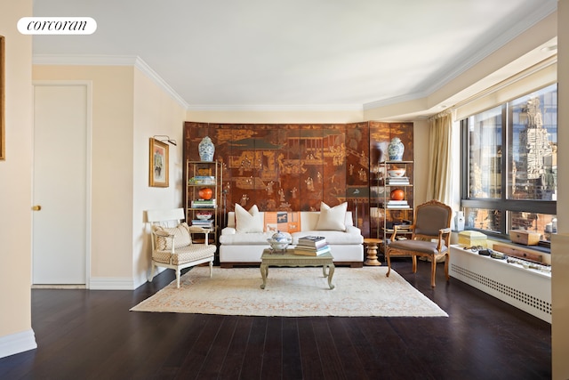 living room featuring dark wood-type flooring and crown molding