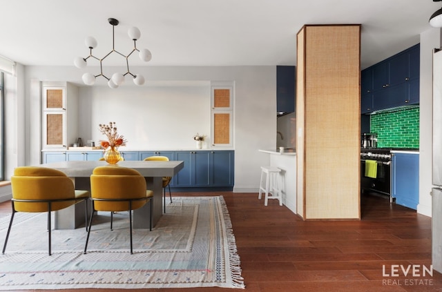 dining room with a chandelier and dark wood-type flooring