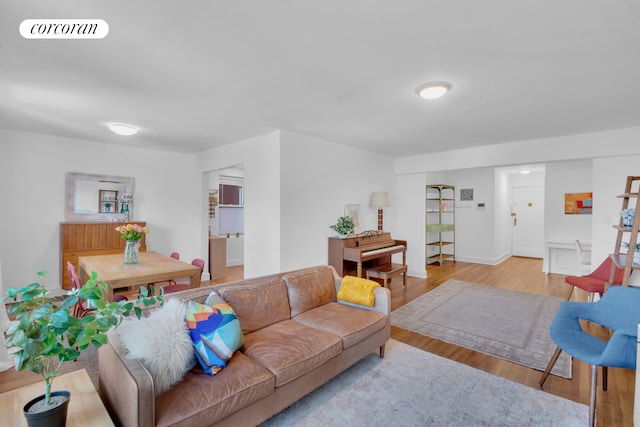 living room with light hardwood / wood-style flooring